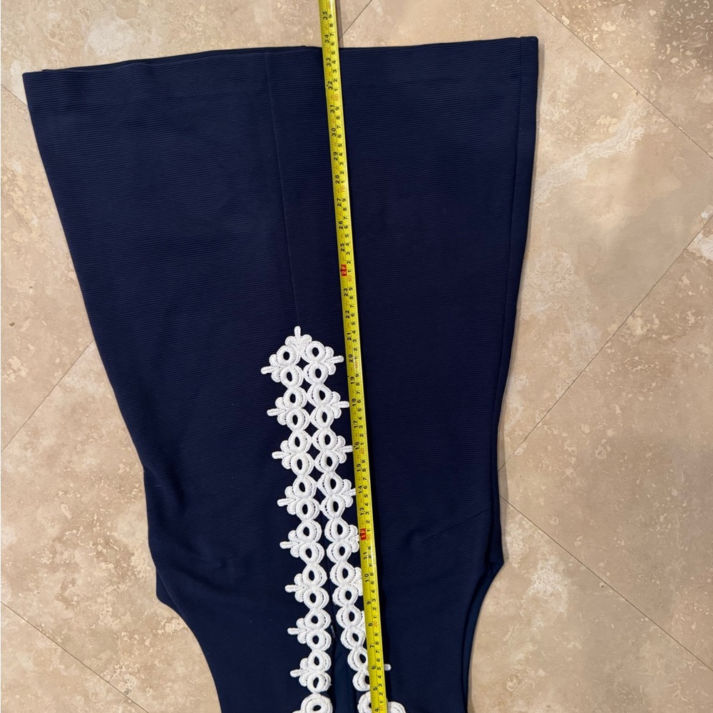 Lilly Pulitzer Navy and white dress.  Fits beautifully.  Enclosed pics are me - Picture 7 of 7
